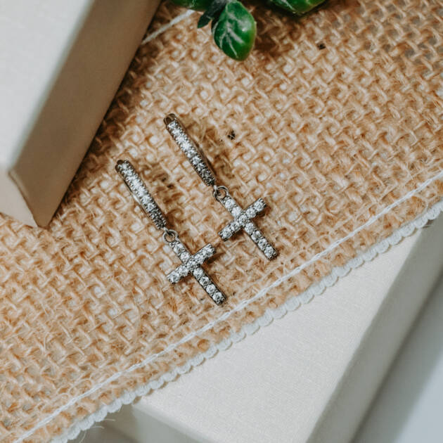 Classic Cross Huggie Earrings – Silver